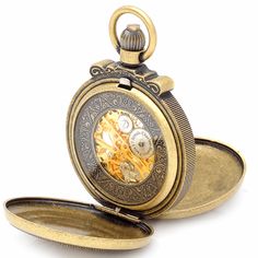 "PRODUCT DESCRIPTION With Old World charm and elegant style, this Charles Hubert pocket watch features an antique gold-tone finish with intricately engraved covers, and matching 12\" chain. Inside, a white calendar dial surrounds the exposed inner 17-jewel mechanism, with contrasting black Roman numerals and hands, protected front and back with scratch-resistant lenses. Add free custom engraving to make this gift truly one-of-a-kind, and it will come packaged in a Charles Hubert gift box. PRODUC Gold Steampunk Watch With Skeleton Dial, Gold Engraved Steampunk Pocket Watch, Gold Pocket Watch With Skeleton Dial, Antique Brass Gold Pocket Watch, Antique Pocket Watch As Gift, Vintage Engraved Gold Watches, Vintage Skeleton Dial Pocket Watch As Gift, Steampunk Gold Watch As Gift, Gold Brass Pocket Watch With Antique Finish