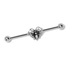 a metal bar with a flower design on the end and two balls attached to it