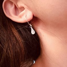 These unique teardrop moonstone dangle drop earrings feature minimalist design of a tiny teardrop moonstone on textured 925 sterling silver ear wires. Add these minimalist teardrop moonstone earrings to your everyday fine jewelry collection or as gift for you loved one. The tiny moonstone dimensions: 4.3 x 7.5 mmMaterials: 925 sterling silver, moonstone Jewelry Care: See more information about how to care for your jewelry here. Shipping Policy: Orders will be shipped within 1-3 business days. Economy shipping will take 7-14 days to arrive and standard shipping is 1- 4 days for U.S. orders. International shipping time is depended on the country and per shipping method. Shipping cost will be calculated at check out.For more details, see our Shipping Policy. Return Policy: Free return within Dainty Teardrop Dangle Earrings, Minimalist Sterling Silver Briolette Earrings, Delicate Sterling Silver Teardrop Earrings, Dainty Nickel-free Teardrop Earrings, Delicate Silver Teardrop Earrings, Dainty Silver Dangle Teardrop Earrings, Delicate Teardrop Moonstone Earrings, Delicate Teardrop Earrings, Dainty Hammered Teardrop Earrings