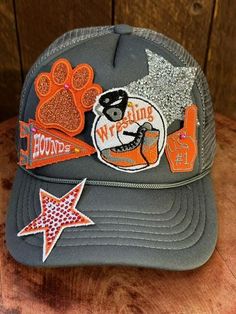 Wrestling Hat, Game day trucker hat, Trucker hat with patches, Wrestling foam hat AT CHECK OUT PLEASE PLEASE PICK SHIP IN A BOX, SHIPPING. You Pick your hat color You get 1 sliver rhinestones 1- Wrestling Patch matching your hat colors 1- Pennant Flag matching your hat colors 1- Foam Hand matching your hat colors 1- Star or Paw matching your hat colors or other please send in notes if you want something different. 1- Star on bill of the hat matching your hat colors Foam front, snapback WHATEVER Hat With Patches, Blue Flag, Pennant Flag, Blue Hat, Trucker Hats, Number 1, Trucker Cap, In A Box, Game Day