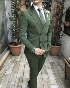 This is a Classic Two-Piece Suit Green color Double Breasted coat from high quality fabric and imported materials. Our products are handcrafted by experienced tailors who make sure the that the stitching is precise, lining is proper, and the overall product is sturdy enough to not go out of shape for more than a few years. Also, all our products available more colors and designs in this collection. Include. Coat Pant   Fabric. Terry Rayon premium  This is a 2-piece set of a Coat and a trouser. W Fitted Three-piece Suit For Groom, Fitted Double-breasted Tuxedo For Wedding, Fitted Double-breasted Wedding Suit With Long Sleeves, Fitted Long Sleeve Double Breasted Suit For Wedding, Fitted Double-breasted Suit For Groom, Green Three-piece Suit For Wedding, Green Long Sleeve Three-piece Suit For Wedding, Green Three-piece Wedding Suit, Green Three-piece Long Sleeve Wedding Suit