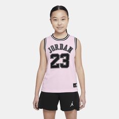 This cropped jersey is modern hoop style made of breathable classic mesh fabric. This top looks great paired with your favorite basketball shorts or with your favorite pair of jeans for cool, streetwear vibes. Basketball Shorts Girls, Cropped Jersey, Jersey Pink, Pink Jordans, Jordan Jersey, Buy Jordans, Basketball Shorts, Shoes With Jeans, Kate Spade New York