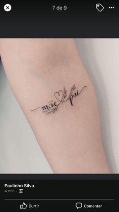 a tattoo with two hearts and the word love written on it