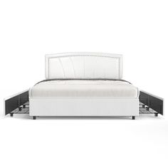 a white bed with black headboard and foot board