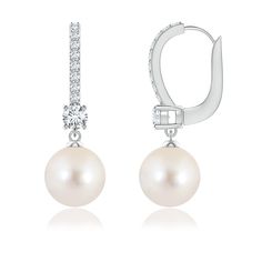 These stunning pearl drop earrings in 14k white gold are crafted with diamond-studded leverbacks. The Freshwater cultured pearls are linked to an additional diamond accent, prong-set at the base of the leverbacks. South Sea Pearls Earrings, Freshwater Pearl Drop Earrings, Sea Pearl, Freshwater Pearls Earrings, South Sea Pearls, Freshwater Cultured Pearls, Pearl Drop Earrings, Pearl Drop, Cultured Pearls