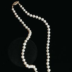 A modern take on a classic staple featuring lustrous white pearls. These luxurious pearl necklaces are hand-knotted on silk, accented with an antique 14k gold basket clasp. The necklace length makes the pearls easy to wear and layer with other pieces. Hand-strung on silk Measures approx. 17" long Finished with an antique 14k clasp Custom lengths available Because our pieces are all made entirely by hand we can offer a huge array of customization! If you have inquiries about custom sizing, stone Luxury Long Single Strand Necklace, Luxury Double Strand Pearl Necklace For Gift, Luxury Single Strand Beaded Necklaces, Classic Yellow Gold Beaded Necklace With Round Beads, Luxury Single Strand Round Beaded Necklace, Luxury Single Strand Beaded Necklace, Classic Yellow Gold Beaded Necklace, Luxury White Double Strand Necklace, Classic Single Strand Round Bead Jewelry