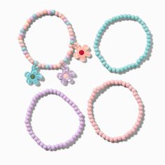 Claire's Club Pastel Flower Charm Seed Bead Stretch Bracelets - 4 Pack Cute Pastel Accessories, Seed Bead Stretch Bracelets, Bead Stretch Bracelets, Pastel Accessories, Pastel Jewelry, Piercing Kit, Arrow Earrings, Fashionable Jewelry, Pastel Flowers