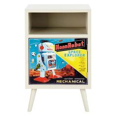 a white wooden shelf with an old fashioned robot on it's front and sides