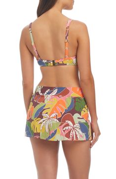 Bring a tropical paradise of vivid color to your beachside ensembles with these hipster bikini bottoms boasting a comfortable skirt-inspired silhouette. Full back coverage Stretch lining 87% nylon, 13% spandex Hand wash, dry flat Imported Tropical Tie-side Swim Skirt For Beach Season, Tropical Green Swim Skirt For Beach Season, Tropical Tie-side Bottom Swim Skirt For Vacation, Tropical Tie-side Swim Skirt For Vacation, Tropical Tie-side Swim Skirt For Pool, Multicolor Swim Skirt For Pool In Beachy Style, Multicolor Swim Skirt For Vacation Swimming, Tropical Swim Skirt For Poolside Vacation, Summer Multicolor Swim Skirt For Poolside