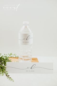 a bottle of water sitting on top of a table