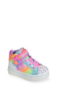 Inspired by a rainbow-filled sky, this glittery sneaker is packed with glitz and finished with a light-up rhinestone cap toe. Adjustable hook-and-loop closure with elastic laces Synthetic and textile upper/textile lining/synthetic sole Imported Trendy Multicolor Glitter Sneakers, Casual Light-up Sneakers With Round Toe, Girls Shoes Sneakers, Skechers Kids, Rainbow Shoes, High Top Sneaker, Elastic Laces, 8 M, Kid Shoes