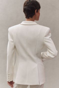 Featuring a flattering tapered waist, the expertly tailored Sloan Structured Blazer features ultra-structured shoulder pads and a plunging neckline, exuding sleek style and undeniable allure. | Sloan Structured Blazer Jacket by SANS FAFF in White, Women's, Size: Smallmall, Polyester/Viscose/Glass at Anthropologie Elegant V-neck Blazer For Semi-formal Occasions, Elegant V-neck Semi-formal Blazer, Sleek Structured Blazer For Semi-formal Occasions, Tailored V-neck Formal Outerwear, Elegant Structured Blazer With Lapel Collar, Chic Structured Boning Blazer For Business, Elegant Business Outerwear With Structured Shoulders, Chic Blazer With Structured Boning For Business, Elegant Structured Semi-formal Blazer