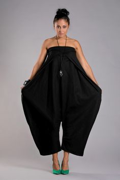 "Black Harem Jumpsuit, Strapless Jumpsuit, Loose Jumpsuit ◈ Multifunctional, funky jumpsuit. Very feminine and cozy for everyday purpose. Suitable for special events as well. Amazing deconstructed cut with volume shape. Made from finest Italian cotton . Wear it as a trendy loose pants too! It has very comfortable pockets and looks great with boots or high heels! Made in Europe. WEAR IT WITH ATTITUDE... ◈ We offer custom fitting without any extra charge, simply send us your measurements (height, Jumpsuit Wide Leg, Harem Jumpsuits, Pocket Jumpsuit, Elegant Black Dress, Wedding Jumpsuit, Loose Jumpsuit, Strapless Jumpsuit, Diana Ross, Funky Fashion