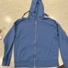 From Walmart Blue Zip Up Hoodie Condition Brand New Basic Blue Hoodie For Winter, Basic Blue Winter Hoodie, Trendy Blue Hoodie For Fall, Basic Blue Sweatshirt For Fall, Blue Hooded Tops For Fall, Blue Hooded Top For Fall, Trendy Blue Top With Drawstring Hood, Trendy Blue Tops With Drawstring Hood, Light Blue Hooded Top For Fall