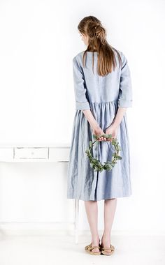 "Handcrafted Oeko-Tex Standard certified 100% European linen smock dress ideal for everyday wear. Perfect for springtime or chilly summer days. Always dress to kill! Neckline: round Silhouette: low waist Hem length: ±45\"/115cm (we can make adjustments) Sleeve lenght: 3/4 Pockets: side seam Details: *Colour shown: navy blue/ charcoal grey/ ice blue *Model is wearing size M *Medium weight *Maternity-friendly *Relaxed fit *Not-ironed (and no need to) *Handmade by @LinenCloud Easy care: - Machine w Spring Flax Linen Dress, Flax Linen Long Sleeve Dress With Relaxed Fit, Spring Long Sleeve Linen Dress With Pockets, Spring Smock Midi Dress With Relaxed Fit, Spring Midi Dress With Smock And Relaxed Fit, Spring Long Sleeve Dress With Slip Pockets, Spring Linen Dress With Pockets, Spring Linen Dress With Pockets And Relaxed Fit, Spring Relaxed Fit Linen Dress In Flax Color