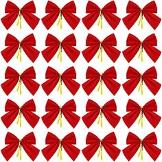 many red bows with gold ribbons on them