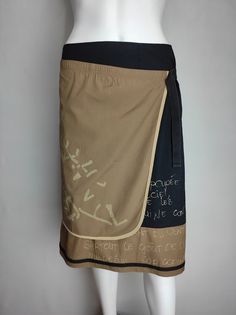 COP COPINE vintage women's cotton skirt Very good condition Size tagged 38, fits like M (please check measurements) Composition: 100% cotton Measurements: Half waist - 14.2" / 36 cm Half hips - 16.1" / 41 cm Skirt length - 23.6" / 60 cm * All measurements are taken with the garment laying flat #4825 Y2k Style Stretch Cotton Skort, Y2k Style Cotton Stretch Skirt, Y2k Style Stretch Cotton Skirt, Casual Cotton Wrap Skirt In Relaxed Fit, Casual Cotton Wrap Skirt With Lining, Y2k Style Cotton Lined Skirt, Y2k Archive, Skirt Streetwear, Skirt Y2k