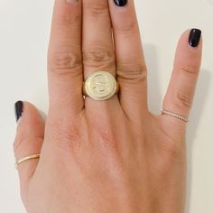 This round shaped signet style ring is composed of 14K solid gold & finished with a pavé diamond initial letter. The gemstones used in this design are of genuine GVs1 quality natural real diamonds. Ring Dimensions: Raised Round Surface: approximately 14mm (diameter) Signet Surface Height from Inner Band Thickness: approximately 4mm Inner Band Ring Thickness: approximately 4.5mm Metal Finish: High Shine Polish This design is available in Rose, White and Yellow 14K Gold This item is proudly ma Personalized Yellow Gold Signet Ring For Everyday, Personalized Rose Gold Signet Ring For Everyday, Everyday Yellow Gold Signet Ring With Initials, Classic Diamond Initial Ring With Monogram, Classic Diamond Monogram Initial Ring, Initials Engraved White Gold Ring, Luxury Everyday Signet Ring, Personalized Oval Diamond Initial Ring, White Gold Initial Ring With Monogram