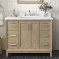 a bathroom vanity with two sinks and a mirror