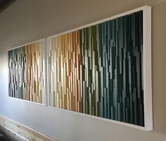 two paintings on the wall next to each other in an office building with sunlight shining through them