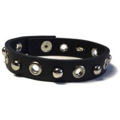 "Studded Leather Bracelet - Silver Grommet Studded Matte Black Leather Wristband - 1/2 Inch Black Leather Wristband This black leather wristband is 1/2 wide and about 8 inches long. It can fit a wrist 7.5\" around. The strap is made of handcut cowhide Genuine leather. It have added 6 Grommet Studs evenly spaced across the center and alternated with 6mm silver dome studs. I have added a silver snap button closure on the ends. It's a strong snap...it does not unsnap easily so there is no fear of i Black Band Wristband For Concerts, Black Punk Wristband For Concert, Edgy Black Cuff Bracelet For Concerts, Adjustable Leather Punk Bracelet, Adjustable Punk Wristband For Concerts, Adjustable Punk Style Leather Bracelet, Edgy Adjustable Cuff Bracelet For Concerts, Adjustable Edgy Cuff Bracelet For Concert, Edgy Adjustable Cuff Bracelet For Concert