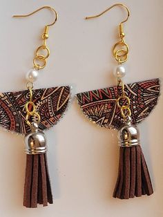 Trendy Fringe Earrings As A Gift, Adjustable Tassel Earrings As Gift, Brown Fringe Tassel Earrings For Gift, Brown Fringe Tassel Earrings As Gift, Brown Fringed Tassel Earrings Gift, Elegant Brown Dangle Tassel Earrings, Handmade Brown Tassel Earrings, Trendy Adjustable Tassel Earrings As Gift, Brown Dangle Earrings With Tassels