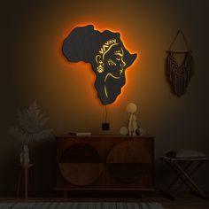 🌍 Illuminate your space with the profound beauty of our high-quality "African Woman Wall Art LED"--a striking fusion of culture, artistry, and illumination that elevates your home decor. This isn't just wall art; it's an electrifying tribute to the grace and strength of African heritage, transforming any room into a vibrant celebration of diversity and womanhood. 💡 Bask in the warm luminescence of our LED African Woman Silhouette, and let it infuse your space with the rich energy of African la East African Art, African Room Decor Ideas, African Bedroom Ideas, African Femininity, African Queen Art, African Decor Bedroom, Afrohemian Decor, African Decor Living Room, Rich Energy