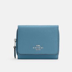 Coach Small Trifold Wallet Sv/Pacific Blue Crossgrain Leather Two Credit Card Slots Full-Length Bill Compartment Id Window Snap Closure Outside Zip Coin Pocket 4" (L) X 3 1/4" (H) X 1 1/2" (W) Style No. 37968 Classic Blue Trifold Wallet For Everyday Use, Classic Blue Trifold Wallet, Elegant Blue Coin Purse With Card Slots, Elegant Blue Coach Wallet, Elegant Compact Coach Trifold Wallet, Blue Coach Wallets With Card Slots, Classic Blue Bags With Card Slots, Elegant Blue Wallet With Coin Pocket, Blue Rectangular Coin Purse