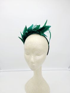 kelly Green feathers headband. Wedding Fascinator. Beautiful headpiece for bridesmaids and a great accessory for a cocktail party or church outfit. Are you trying to match an outfit? Send a picture and I will help you find a best hat to match your outfit. - Rare find - Ready to ship - Lightweight - Free Shipping - Fast shipping - Customize by adding different color flowers and or feathers Check my store for for styles and colors. Hatsandpearls.etsy.com Find more at my website: www.hatsandpearls. Summer Feather Headband Fascinator, Adjustable Mini Hat With Feathers For Kentucky Derby, Summer Party Headband With Feather Trim, Adjustable Feather Trim Headpiece For Kentucky Derby, Summer Feather Trim Costume Headband, Summer Costume Headband With Feather Trim, Adjustable Feather Trim Headpieces For Summer, Adjustable Feather Trim Headpieces For Spring, Adjustable Summer Headpiece With Feather Trim