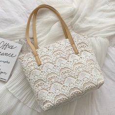 Fairy lace one-shoulder bag, new style, artistic canvas bag, fresh handbagMaterial:laceStyle:fairyFeatures:artistic,freshColor:white,blackSize(cm):free 1inch=2.54cmup width:35,down width:29,high:27,thick:11&ltp&gtNote:Due to different measurement methods,there will be 1-3 error(unite:cm), please understand.</p>&ltbr/>&ltp&gtPlease check the size carefully when you choose items,thank you.</p>&ltbr/> Chalk Pens, Lace Fashion, Womens Purses, Kate Spade Top Handle Bag, Michael Kors Monogram, New Style, You Choose, Canvas Bag, Stylish Women