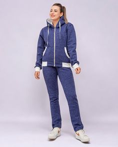 Expertly designed for maximum comfort and style, the Women's Flora hoodie and sweatpants set is perfect for everyday wear. Made with soft fleece material, this set provides warmth and coziness, while the zip up design allows for adjustable coverage. Elevate your loungewear game with this trendy and comfortable set. About this item1.Full Zip up Fleece hoodie with 2 side pockets2.Comfortable and durable fleece material set3.Relaxed and comfortable fitting4.Machine wash. Machine Dry. Product detailsFabric type : 60% Cotton, 40% PolyesterCare instructions: Machine WashOrigin: Imported Winter Fleece Tracksuit For Loungewear, Hooded Tracksuit For Loungewear, Hooded Sportswear Tracksuit For Loungewear, Sportswear Tracksuit With Pockets For Loungewear, Winter Tracksuit With Kangaroo Pocket, Fleece Tracksuit With Pockets And Long Sleeves, Cozy Fleece Tracksuit With Relaxed Fit, Cozy Fleece Tracksuit, Winter Hooded Tracksuit For Loungewear