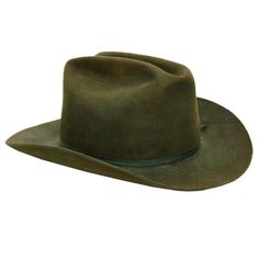 A stylish Sheplers Hat in a rich green hue, accompanied by a sleek vinyl hat container. The container, measuring 15 inches in diameter and 9 inches in height, is the perfect safekeeping for this fashionable accessory. The hat itself boasts dimensions of 12 inches in width, 14 inches in depth, and 6 inches in height. Green Short Brim Hat Bands For Rodeo, Green Hat Bands For Rodeo With Short Brim, Green Wide Brim Western Hat, Green Fedora For Country Events, Green Flat Brim Hat For Country Events, Green Fedora Hat For Rodeo, Classic Green Fedora With Short Brim, Green Curved Brim Hat For Travel, Western Green Hat For Country Events