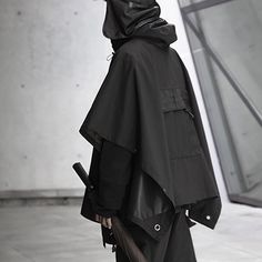 Introducing the Urban Ninja Cloak Jacket - Your Ultimate Unisex Techwear Choice for Cyberpunk Style! Elevate your fashion game with the Urban Ninja Cloak Jacket, a masterpiece that seamlessly blends techwear aesthetics with cyberpunk vibes. Crafted with meticulous attention to detail, this black marvel is more than just a jacket; it's a statement of your unique style. Constructed from high-quality polyester material, it boasts not only an eye-catching appearance but also impressive durability to withstand the demands of modern urban living. Unisize - Chest: 115 cm (45.3 inches); Length: 75 cm (29.5 inches); Designed to be more than just fashionable, the Urban Ninja Cloak Jacket is built for functionality. Its waterproof feature ensures that you remain stylishly shielded from the elements, Ninja Aesthetic Black, Cybertech Outfits, Hooded Techwear For Halloween, Halloween Hooded Techwear Outerwear, Hooded Techwear Outerwear For Halloween, Cyberpunk Outerwear With Detachable Hood For Streetwear, Cyberpunk Hooded Outerwear For Winter, Cyberpunk Black Windbreaker For Streetwear, Cyberpunk Hooded Winter Outerwear