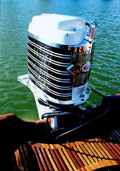 the front end of a motor boat in the water