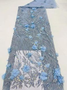 Elegant Organza Fabric With 3d Embroidery, Elegant Sequin Tulle Fabric With Floral Embroidery, Elegant Sequin Fabric For Spring Wedding, Elegant Spring Wedding Sequin Fabric, Blue Embroidered Wedding Fabric With Rhinestones, Elegant Tulle Fabric With Appliques For Party, Elegant Applique Tulle Fabric For Party, Elegant Party Tulle Fabric With Appliques, Elegant Embroidered Fabric With Appliques For Party