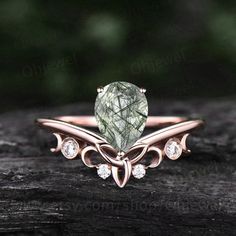 "This is a green Rutilated Quartz engagement ring in solid gold,about 6x8mm pear cut. The accent stones are round diamonds or moissanites. It can be made in any ring size. However please contact me to custom make it to a special big or small size. It can be made in white gold,rose gold or yellow gold with 14k or 18k. However for some people who are nickel allergic,I can also make it to 925 sterling silver to make you can wear it. The ring is handmade,very high quality! 30 days money back guarant Diamond Ring Women, Wedding Ring Sets Unique, Marquise Cut Rings, Quartz Engagement Ring, Rutilated Quartz Ring, Agate Engagement Ring, Green Moss Agate, Silver Diamond Ring, Viking Ring