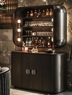 a cabinet with liquor bottles and glasses on it