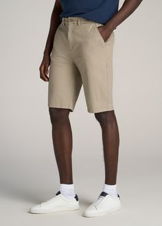 About Our Men's Long Chino Shorts Look stylish and beat the heat in these chino-style tall men's shorts. They're a shorter version of our popular chino pants that you'll want to wear all summer long. Finding clothes when you're tall is hard enough, but finding shorts is a whole other story – you need a pair that's long enough while still providing a flattering fit. That's where we come in. We crafted these shorts with your height in mind, with two different inseam options that end at the knee an Fitted Casual Chinos For Summer, Summer Relaxed Fit Khaki Chinos, Fitted Casual Cargo Shorts For Spring, Summer Casual Chino Cotton Twill Bottoms, Casual Summer Cotton Chinos, Summer Chino Cotton Twill Bottoms With Pockets, Summer Cotton Chinos, Relaxed Fit Chino Cotton Twill Bottoms, Short Length, Relaxed Fit Chino Cotton Twill Bottoms In Short Length