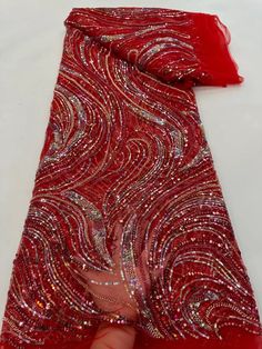 This high quality Fabric is measured in 5 Yards With Embroidered Beading and Sequin. It is soft, very delicate and beautiful. This high Quality Fabric is made with Fashion embroidered rhinestones can be used in making party wedding dresses, skirts, shawls, scarves and other other fashion apparels as you would like. Size : Length : 5 yards (180 inch). Width: 50 inch (Please allow slight deviation for the measurement data ,±1 inch) Material: 100% Polyester, Tulle Lace Fabric, Eco-Friendly embroide Festive Lace Sequin Fabric With Rhinestones, Elegant Embellished Red Embroidered Fabric, Elegant Red Embellished Embroidered Fabric, Elegant Red Embellished Sequin Fabric, Elegant Red Embroidered Fabric With Sequins, Elegant Red Embroidered Sequin Fabric, Party Lace Fabric With Rhinestones Embroidery, Red Sequined Embroidered Fabric For Party, Red Embroidered Fabric With Sequins For Party