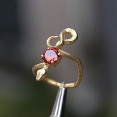 Snake Ruby Gold Plated Ring, 925 Sterling Silver Gold Plated Ring, Garnet Snake Silver Ring, Ruby Silver Ring, Animal Jewelry, Gift For Her Let's not forget that it is handmade. There may be minor differences. I can work the same ring with other natural Gemstones.  Please contact us to learn about our Gem stone stocks. If you have any questions, please feel free to contact me, we are happy to help. Your jewelry will be packed in a luxury jewelry box ready to be given as a special gift. Visit my Snake Ring With Stone, Gemstone Snake Ring Gift, Snake Jewelry Ring, Ruby Silver Ring, Luxury Jewelry Box, Ring Ruby, Snake Jewelry, Gothic Rings, Garnet Jewelry