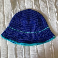 Hi! This one is also a favorite of mine, I think it's so summery and does a good job of keeping the sun out of your eyes. Fits a 22-24 inch circumference head and is very stretchy. Fitted Bucket Hat For The Beach, Lightweight Crochet Beach Cap, Blue Bucket Hat With Uv Protection For Beach Season, Fitted Yarn Beach Hat, Lightweight Crochet Cap For Vacation, Fitted Crochet Beanie For Beach, Blue Summer Bucket Hat For Beach Season, Adjustable Lightweight Crochet Hat For Warm Weather, Summer Yarn Cap