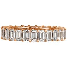 This gorgeous diamond eternity band showcases 4.00ct of perfectly matched emerald cut diamonds graded at E-F, VVS2-VS1. Each diamond is hand selected and beautifully showcased in this classic 18k rose gold setting. All eternity bands are shown in a size 6.5. We custom craft each eternity band and will create the same design for you in your desired ring size. Please contact us with any questions. Thank you. Emerald Cut Diamond Eternity Band, Rose Gold Eternity Band, Memory Ring, Gold Eternity Band, Emerald Cut Diamond Ring, Diamond Eternity Band, Emerald Cut Diamond, Premium Colors, Fancy Color Diamonds