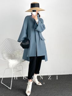 Retro cape loose woolen coat - Milia – ORUMATORU Spring Wool Coat With Stand Collar, Blue Single-breasted Wool Coat For Spring, Blue Wool Coat With Pockets For Fall, Long Sleeve Cape With Buttons For Fall, Elegant Oversized Long Sleeve Cape, Blue Cape Outerwear For Spring, Winter Long Sleeve Button Cape, Winter Long Sleeve Cape With Buttons, Elegant Blue Outerwear With Stand Collar