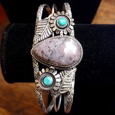 This Adjustable Sterling Silver Bracelet Has A Beautiful Center Piece Jasper Stone. Jasper Comes In Many Different Colors. This One In Particular Leans More Towards The Color Of A Greyish Lavender. Jasper Has Been Used For Protection While Absorbing Negative Energy. The Width And Length Measurements Are Pictured In The Photos Above; Although This Cuff Can Be Adjusted To Almost Any Size. Adjustable Southwestern Silver Bangle, Adjustable Silver Southwestern Bangle, Adjustable Silver Southwestern Bracelet, Southwestern Silver Bangle Jewelry, Silver Southwestern Style Bracelet With Oyster Clasp, Silver Southwestern Style Oyster Bracelet, Southwestern Style Silver Oyster Bracelet, Bohemian Silver Bracelets, Southwestern Silver Bracelet Jewelry