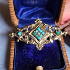 Magical brooch, around 1830-1850, made of tested 585 yellow gold, set with 10 little turquoise pearls and a Saaperle. It probably comes from France and is very detailed hand driven. The condition is really nice with great patina see photos. Length approx. 3.8 cm Width about 2 cm All items in my shop are sold according to §25a UStG differential taxation. An invoice prepared by Etsy is included with every purchase. If you have any questions about the item, about me personally or about the order, d Seed Pearl Jewelry, Antique Pins, Victorian Design, Antique Market, Blue Gems, Pearl Brooch, Seed Pearl, Gold Set, Design Floral