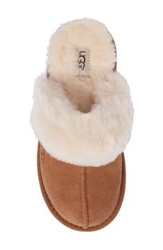 A soft, genuine-shearling cuff and plush UGGpure lining add to the cozy warmth of a cute scuff slipper grounded by a sunburst-logo tread. Lightly padded footbed UGGpure is a textile made entirely from wool to feel and wear like genuine shearling Leather and genuine-shearling upper/UGGpure wool lining/synthetic sole Shearling may be sourced from Australia, China, Italy, New Zealand, Spain or USA. See packaging for confirmed country of origin Imported Kids' Shoes Boots Streetwear, Cute Uggs, Shoes For School, Preppy Shoes, Pretty Shoes Sneakers, Shoe Wishlist, Cute Slippers, Cute Nike Shoes, Ugg Slippers