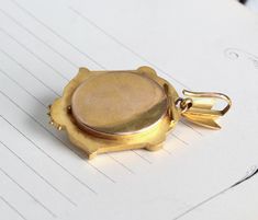 "A beautifully detailed antique Victorian locket circa 1875; crafted in 14k yellow gold featuring a romantic double heart design on the front cover, accented by delicate Etruscan-style filigree work and creamy white seed pearls. The back is plain and could be engraved with your choice of monogram initials, or perhaps a special date; with its deep inner chamber it's perfect for a photo or small keepsake such as a lock of hair. Please convo me before purchase if you are interested in the details o Victorian Yellow Gold Locket Necklace For Formal Occasions, Victorian Gold Cameo Locket Necklace, Victorian Engraved Yellow Gold Locket Necklace, Victorian Yellow Gold Pendant Locket Necklace, Victorian Rose Gold Locket Necklace, Victorian Locket Necklace Stamped 14k, Victorian Yellow Gold Locket Jewelry, Victorian Pendant Locket Necklace For Anniversary, Victorian 14k Gold Locket Necklace