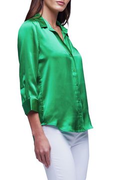 This elevated version of the classic button-up is cut from lustrous silk charmeuse with a smooth drape. 27" length (size Medium) Front button closure Spread collar Three-quarter sleeves with button cuffs Curved hem 100% silk Dry clean Imported via C Sleek Silk Top With Button Closure, Sleek Satin Blouse With Buttons, Green Silk Button-up Blouse, Sleek Silk Tops With Buttons, Sleek Satin Blouse With Button Closure, Silk Button-up Blouse, Classic Satin Blouse With Button Cuffs, Classic Silk Blouse With Button Closure, Elegant Satin Top With Spread Collar