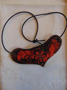 Rosemaling by Jan.  Wooden necklace painted in the Raudsaumsmalingin style of Rosemaling by Jan Boettcher.  Signed by Jan Great gift or something special for yourself. Traditional Red Hand-painted Necklace, Traditional Red Hand Painted Necklace, Wooden Necklace, Something Special, Pendant Necklaces, Jewelry Necklace Pendant, Great Gifts, Jewelry Necklaces, Necklaces