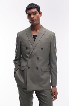 A modern hue brings eye-catching appeal to a dapper double-breasted suit jacket cut in a skinny fit for a sharp, streamlined look. 30 1/2" length (size 42r) Double-breasted button closure Notched lapels Nonfunctional four-button cuffs Chest welt pocket; front flap pockets 86% polyester, 13% viscose, 1% elastane Machine wash, line dry Imported lined Modern Fitted Blazer Dress For Formal Occasions, Modern Notch Lapel Blazer Dress For Formal Occasions, Spring Double Breasted Long Sleeve Suit For Office, Modern Formal Blazer Dress With Notch Lapel, Spring Double Breasted Long Sleeve Office Suit, Modern Blazer Dress With Notch Lapel For Formal Occasions, Spring Office Wear Double Breasted Long Sleeve Suit, Spring Fitted Pea Coat With Notch Lapel, Slim Fit Double Breasted Suit For Semi-formal Occasions